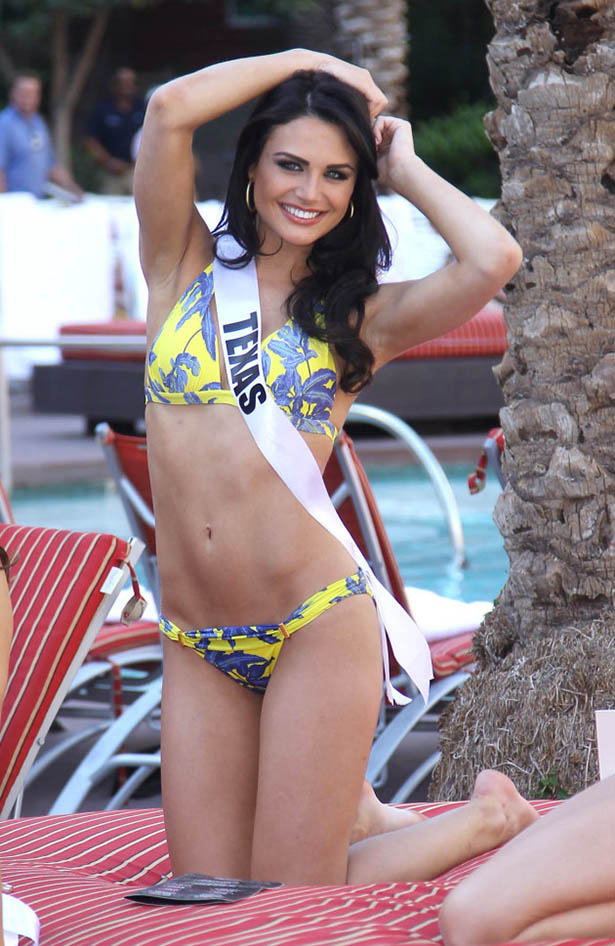 2013 Miss USA contestants take part in paddle board race at GO Pool inside the Flamingo Hotel and Casino