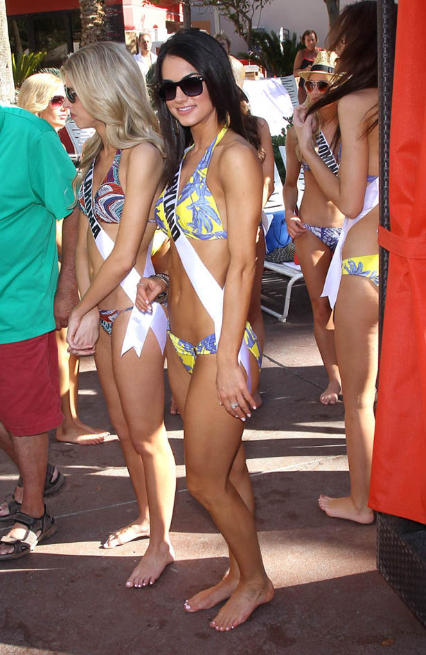 2013 Miss USA contestants take part in paddle board race at GO Pool inside the Flamingo Hotel and Casino